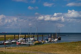 boats near the shore at sea
