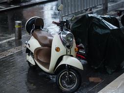 parked beige moped in Zhengzhou