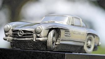 Beautiful, old model of the Mercedes Car 300Sl at blurred background