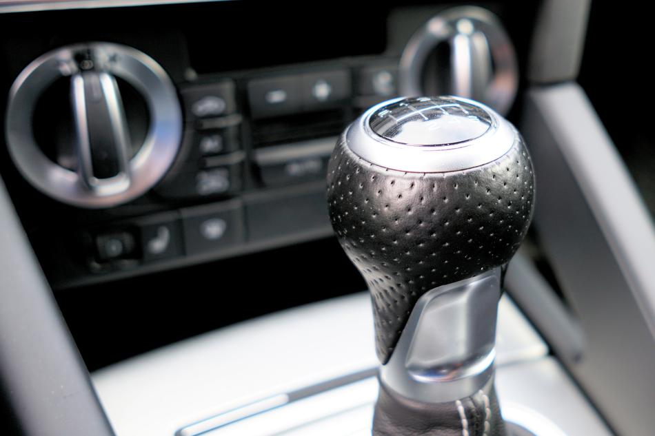 gear lever in the saloon audi in black and white blurred background