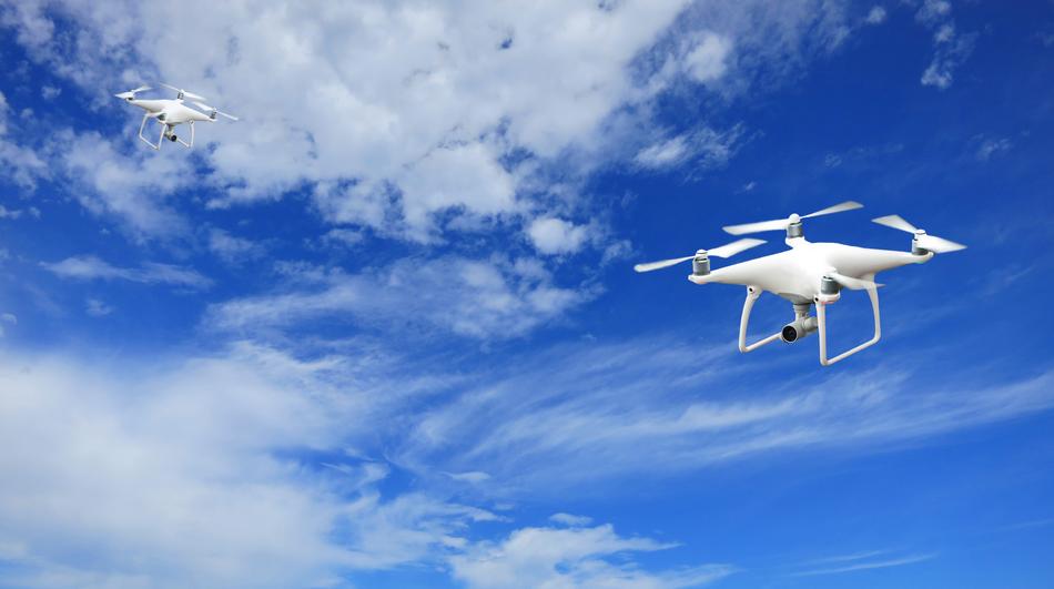 two Phantom P4 Dji Drones at sky