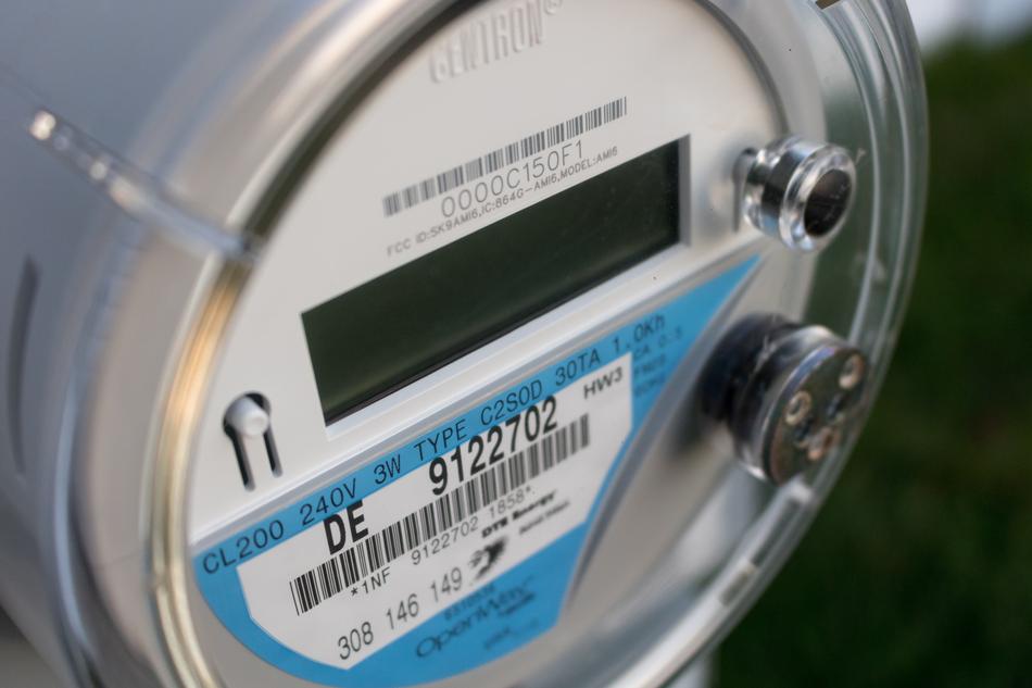 Close-up of the shiny electrical meter with numbers