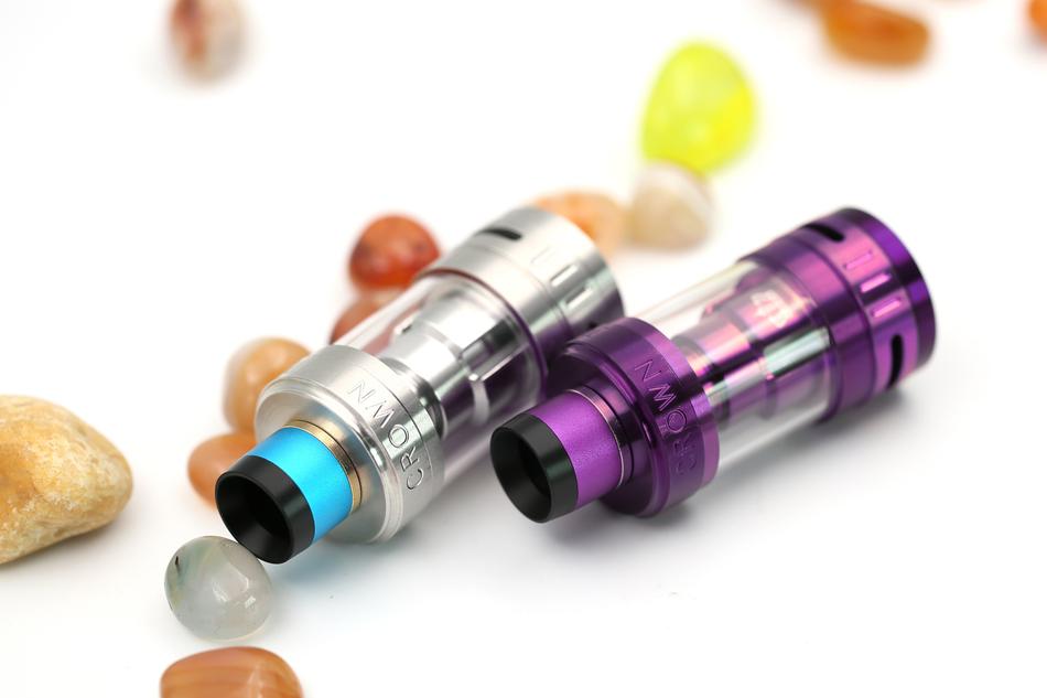 two atomizers for vape among the candies