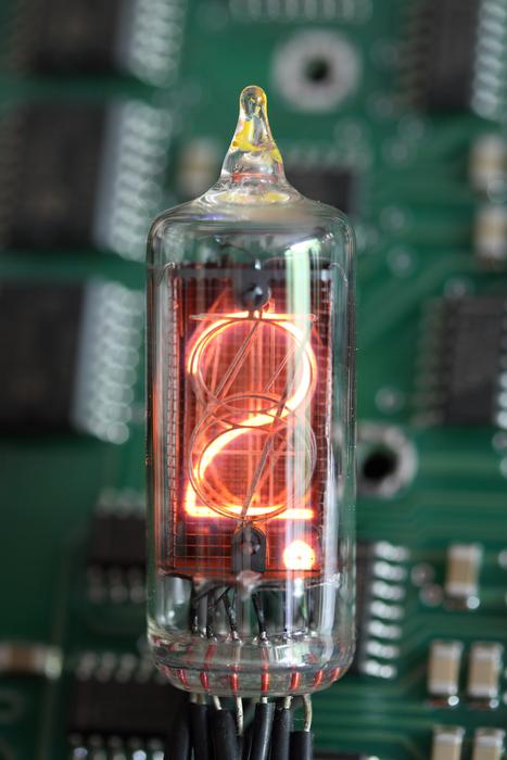 LED lamp on the background of the motherboard