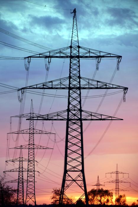 power lines on a violet-blue sunset background