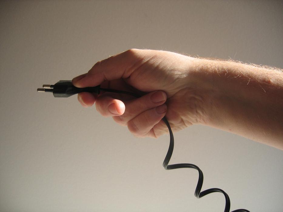cable plug in hand
