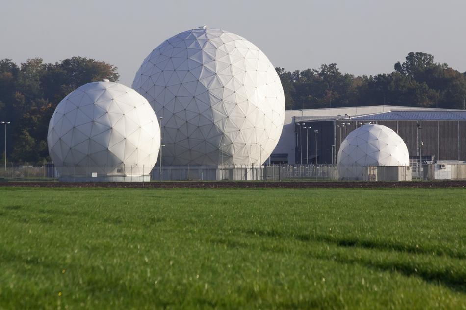 White radar and building, among the beautiful green fields and trees