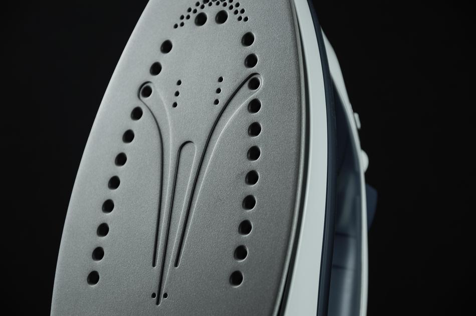 iron on the black background