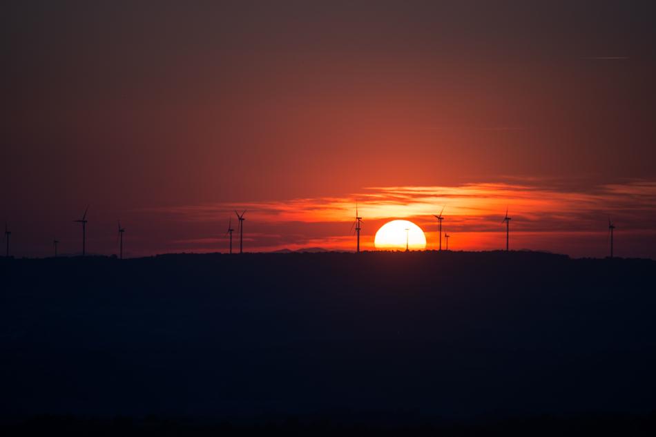 windpark on a background of colorful red sunset