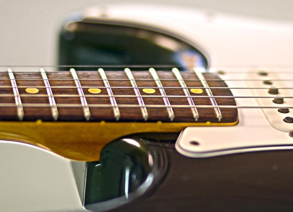 Beautiful, white 'Fender' electric guitar
