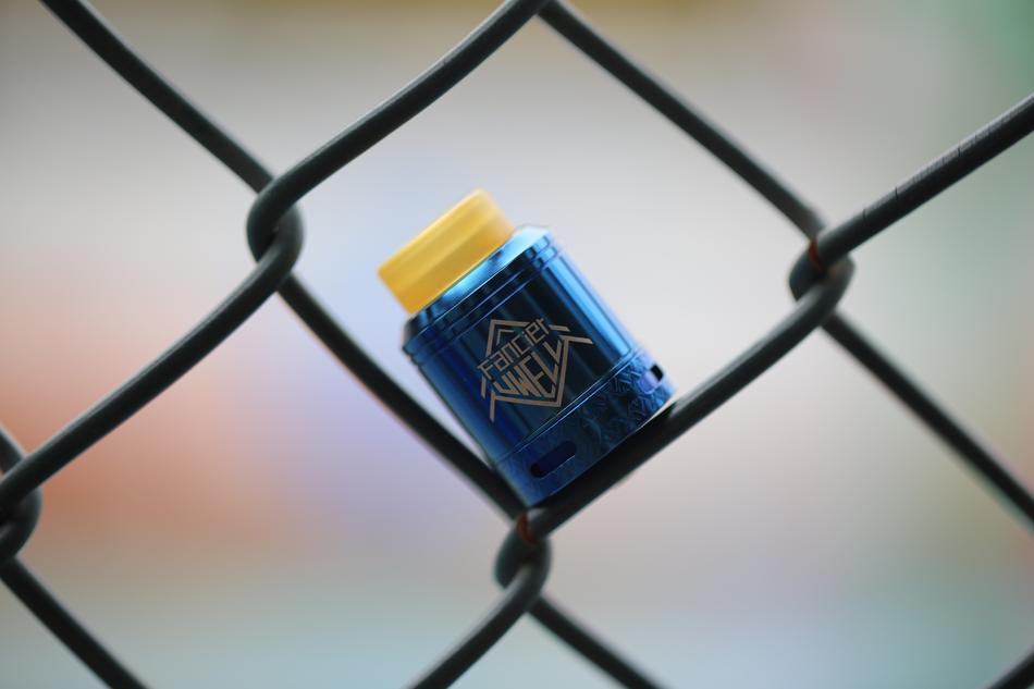 Vape Electronic Cigarette on the iron fence