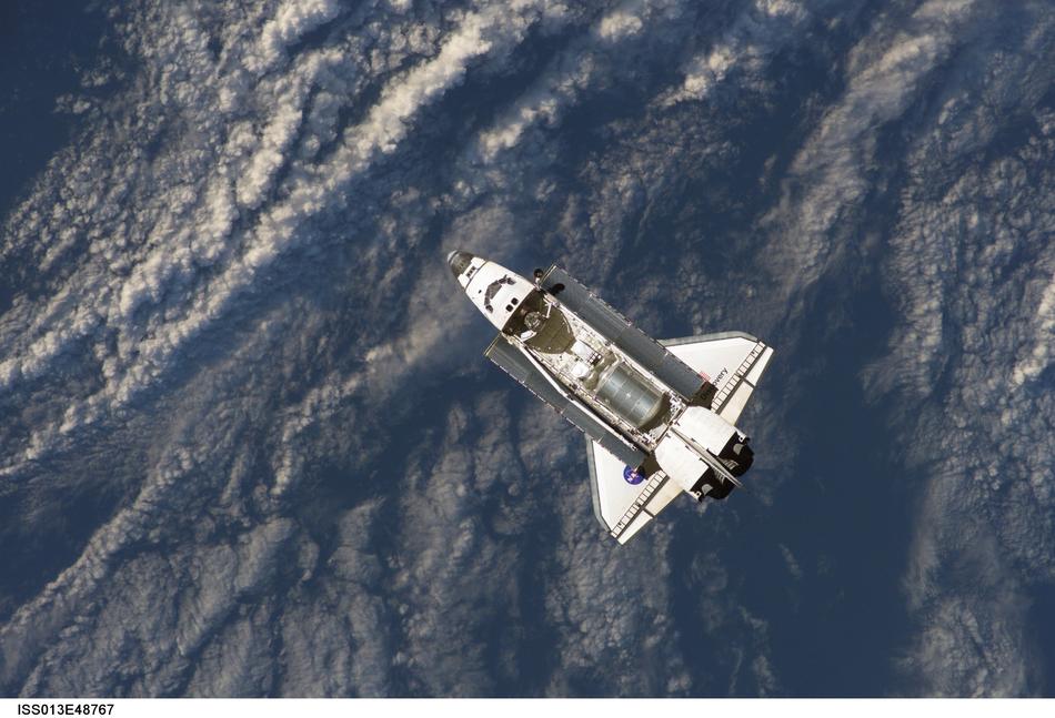 NASA space shuttle over Cape Canav