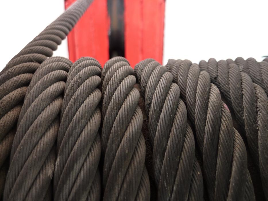 Close-up of the black, steel cable on the construction