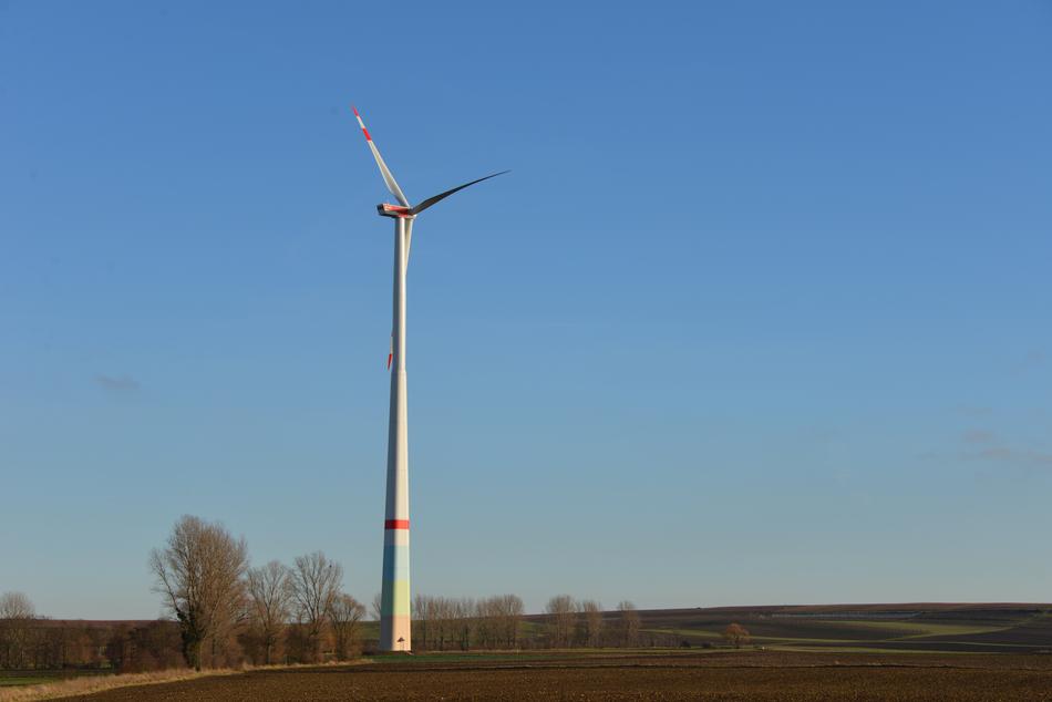 wind power in an open field on a clear day