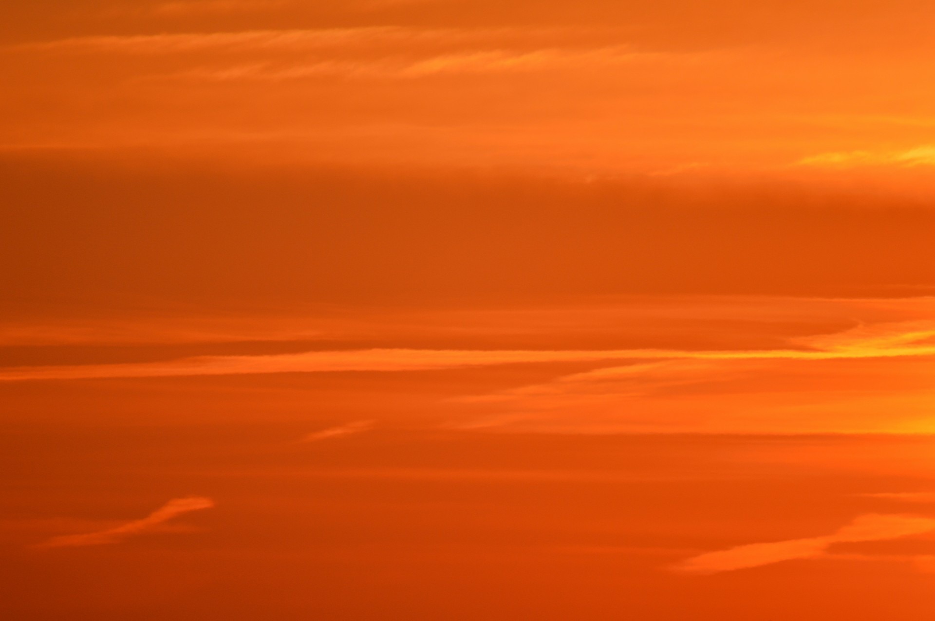 Beautiful, orange and red sunset in the sky with clouds free image download