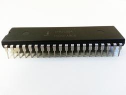 Black transistor with pins, on the white surface