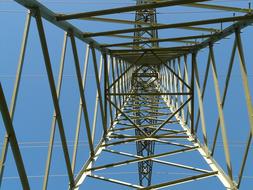 views of tailed metal pillar on blue sky