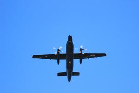 airplane with propellers in the blue sky