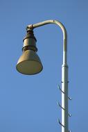 Close-up of the station lamp, at blue sky on background