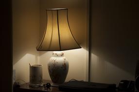 warm light from a table lamp