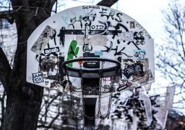 graffiti on a basketball hoop