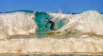 surfer in neoprene suit