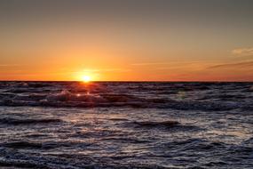 Beautiful waterscape at colorful sunset on the horizon, in Poland