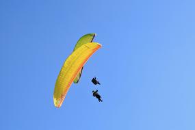 two Paragliders in flight