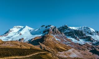 snow on top of mountains in switzerland