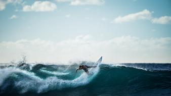 surfing wave blue