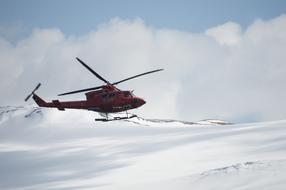 red Helicopter Snow Mountain