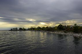 Toronto Lake at cloudy sunset, canada