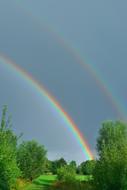 rainbow in the sky on a sunny day