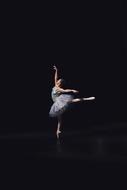 ballerina dance on stage in the dark