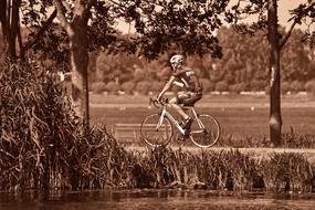 old photo of a cyclist during a race