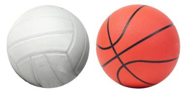 White volleyball and orange and black basketball, at white background