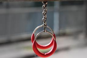 gymnastic rings on the playground on a blurred background