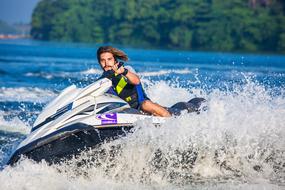 young man on jet ski