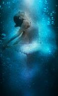 Side view of the ballerina woman, in the blue water, with the bubbles, clipart