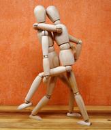 two hinged dolls dance tango