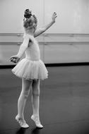 black and white photo of ballerina in the studio