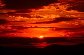 colorful red sunset over the valley