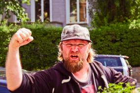 man with baseball cap