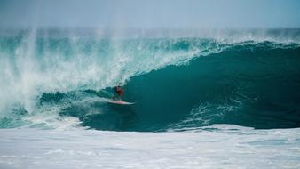 surfing the big turquoise wave