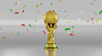 golden football cup and colorful confetti