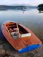 Paddling Boat with Wooden deck on beach