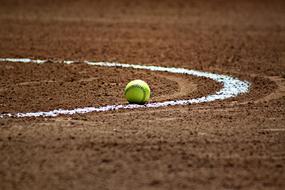 green ball on softball field