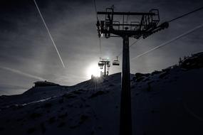 black and white photo of the cable car in the Alps