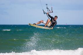 action photo of Kite Boarder Wave Jumping