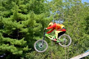 mountain bike racing in a green park